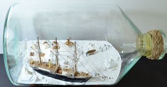 Ship in bottle depicting Edward Shackleton's trip to Antarctica aboard the Endurance